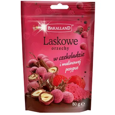 Orzechy laskowe w czekoladzie i malinowej posypce BAKALLAND 80g